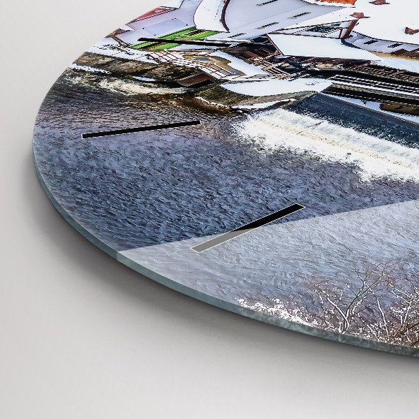 Round glass clock Panorama of the city in winter
