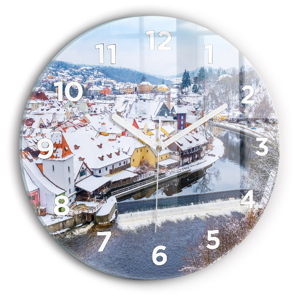 Round glass clock Panorama of the city in winter