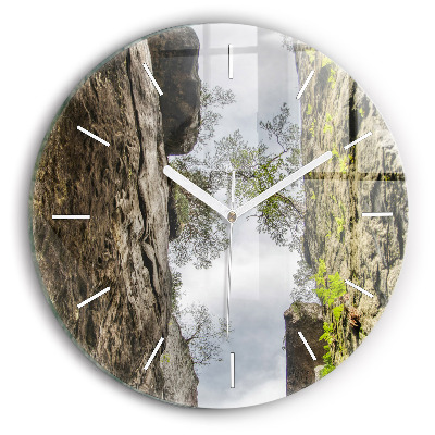 Round glass clock Rock city in the Czech Republic