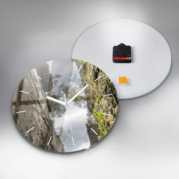 Round glass clock Rock city in the Czech Republic