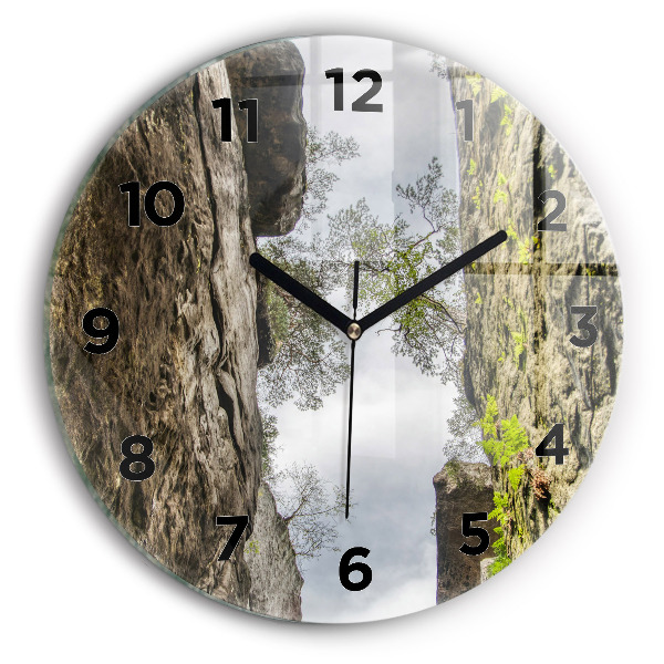 Round glass clock Rock city in the Czech Republic