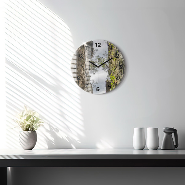 Round glass clock Rock city in the Czech Republic