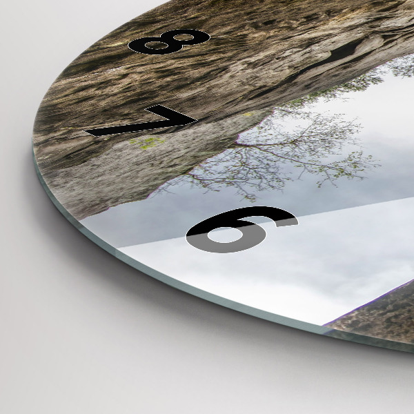 Round glass clock Rock city in the Czech Republic