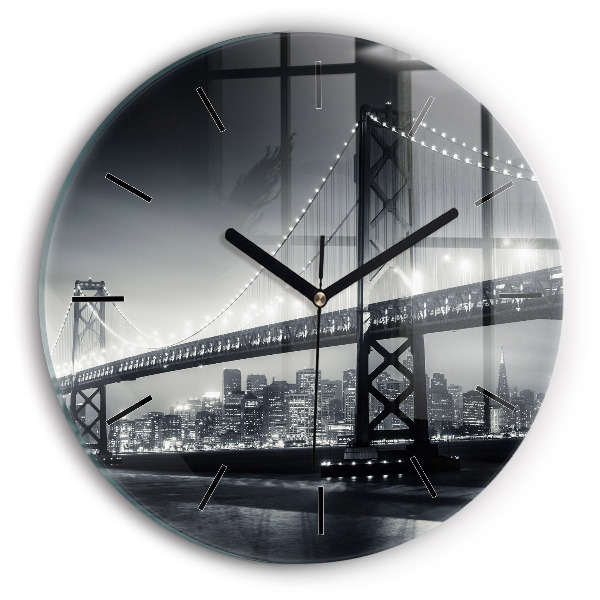 Round glass clock San Francisco Bridge at Night