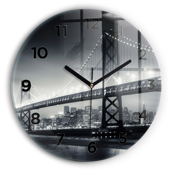 Round glass clock San Francisco Bridge at Night