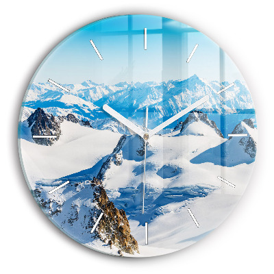 Round glass clock Skier in the Alps