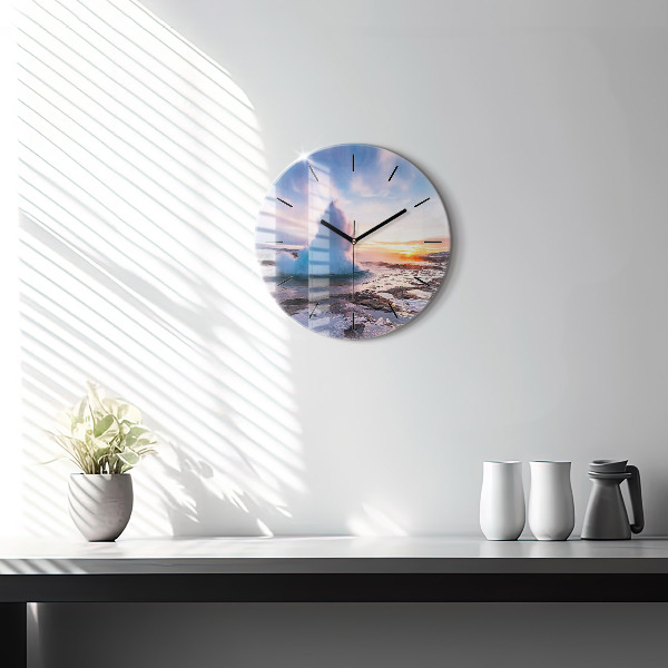 Round glass clock Geyser on the island of Iceland