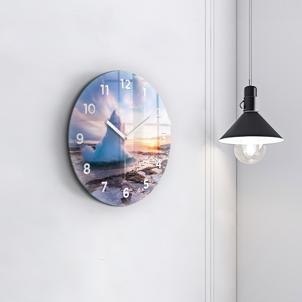 Round glass clock Geyser on the island of Iceland