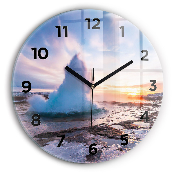 Round glass clock Geyser on the island of Iceland