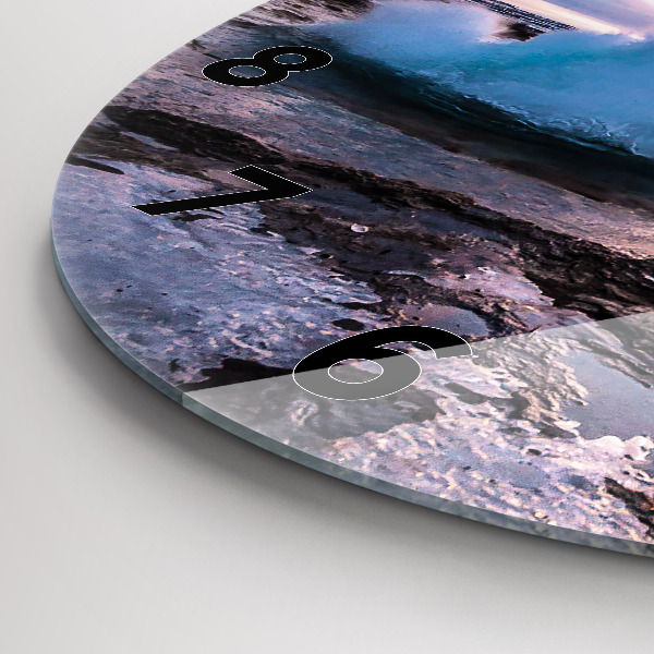 Round glass clock Geyser on the island of Iceland