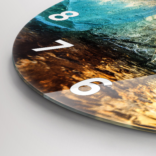 Round glass clock Iceberg and sunrise