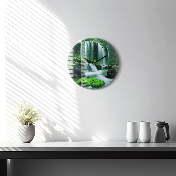 Round glass clock Waterfall among the moss