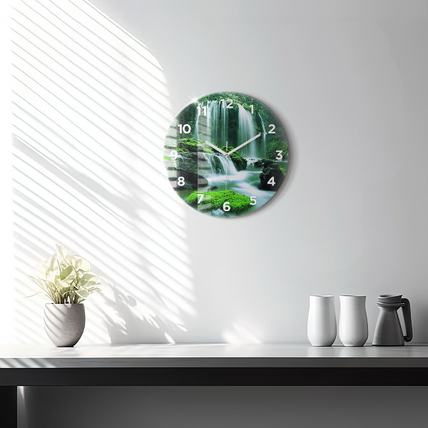 Round glass clock Waterfall among the moss