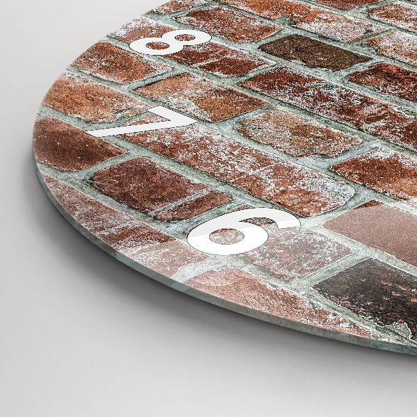 Round glass clock Brick wall