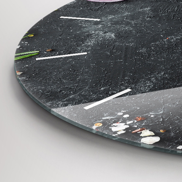 Round glass clock Vegetables on the table