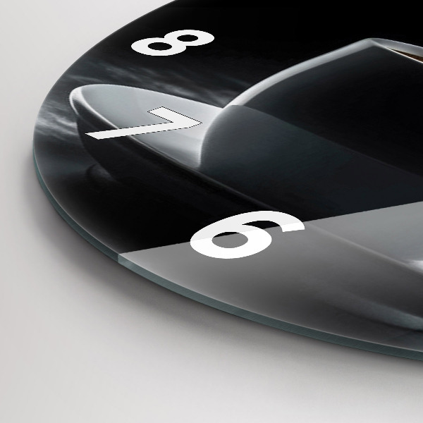 Round glass clock A cup of black coffee