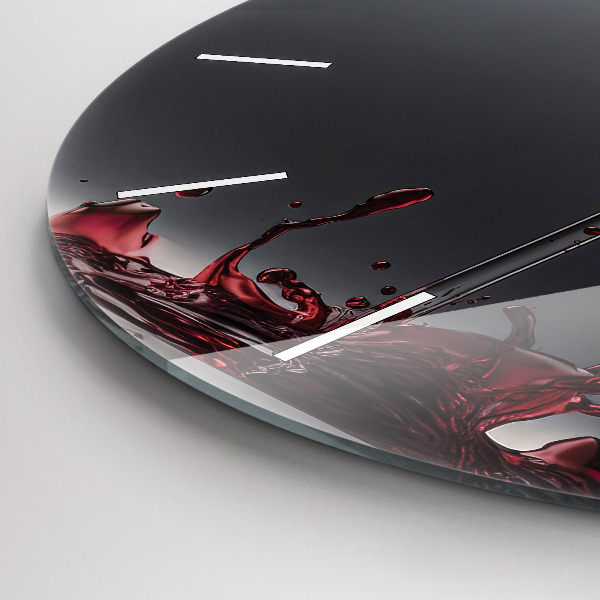 Round glass clock A glass of red wine