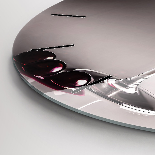 Round glass clock A glass of red wine