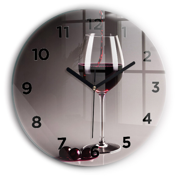Round glass clock A glass of red wine