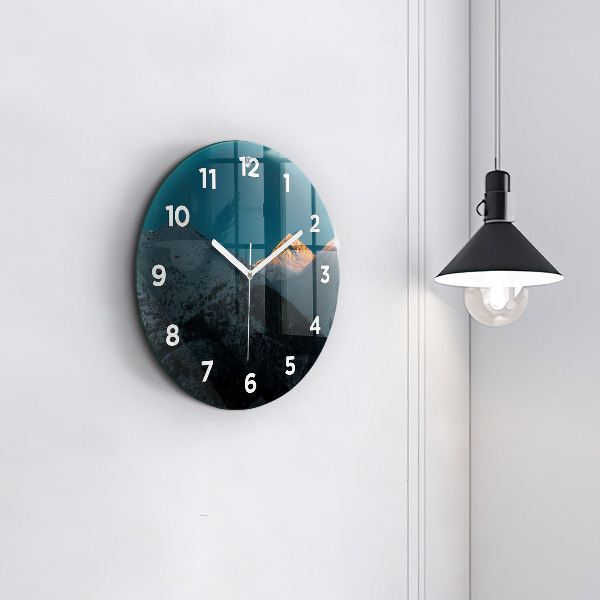 Round glass clock Sunset in the mountains