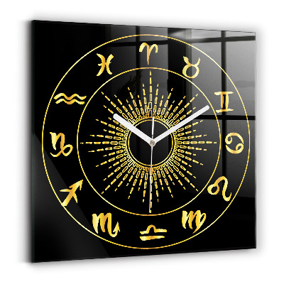 Square glass clock Golden zodiac signs on black background
